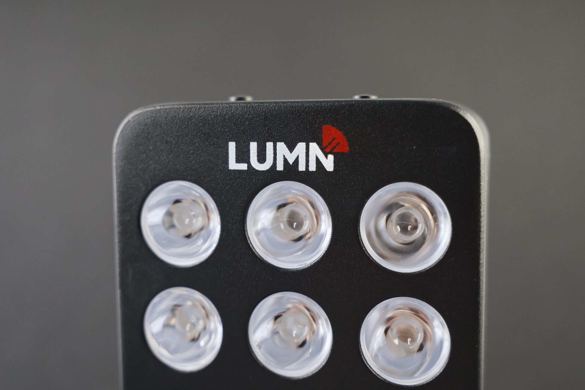 LUMN Mini handheld red light therapy device with carrying case
