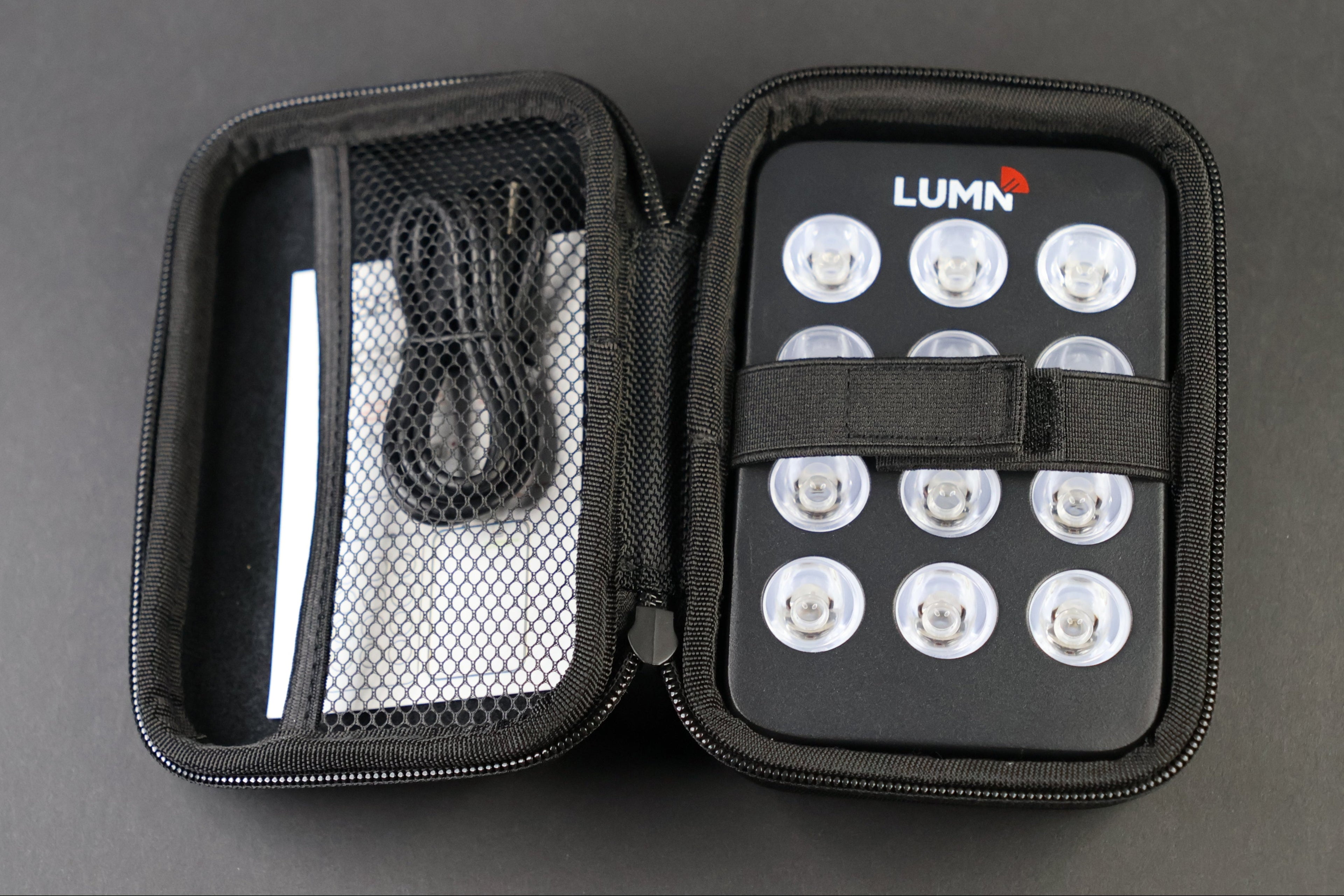 LUMN Mini handheld red light therapy device with carrying case