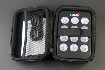 LUMN Mini handheld red light therapy device with carrying case